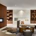 Crowne Plaza Toronto Airport lobby lounge in Toronto with sectional seating, coffee tables and built-in shelves