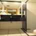 Luxor Soft Hotel Teresina bathroom with glass shower, vanity sink and toilet in Teresina