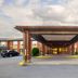 Comfort Inn Kingston - Highway 401 entrance with covered drive-up canopy in Kingston