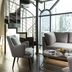 Marquis Reforma Mexico City suite with spiral staircase, floor-to-ceiling windows and city view