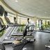 Four Points by Sheraton London fitness center with treadmills, weights, and large windows