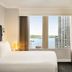 Hilton Motif Seattle guest room with city and water view through large window