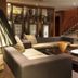 AC Hotels by Marriott La Rioja lobby lounge in Logroño with sectional seating, display shelves and staircase
