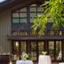 Hotel Saint Vincent in New Orleans exterior with string lights and patio tables
