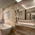 Kempinski Hotel Beijing Yansha Center bathroom with freestanding tub and large mirror, Beijing