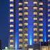 Holiday Inn Express Windsor Waterfront by IHG in Windsor, lit high-rise hotel exterior at night