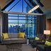 Novotel Toronto North York lounge with city skyline view through floor-to-ceiling windows