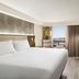 Crowne Plaza Toronto Airport By IHG guest room with king bed, desk, city view, and large window