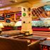 The Orleans Hotel & Casino Las Vegas lobby lounge with leather seating and colorful casino-inspired decor