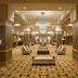 Marriott Downtown at CF Toronto Eaton Centre lobby in Toronto with lounge seating and chandeliers