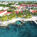 Aerial view of Cozumel Hotel & Resort in Cozumel with beachfront, docks, and turquoise water