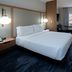 Fairfield by Marriott Inn & Suites Seattle Sea-Tac Airport guest room with king bed and window seating
