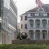Voco St. James Hotel by IHG in New Orleans exterior with Broadway Campus sign and American flag