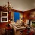 Intercontinental Hotels Mark Hopkins San Francisco suite with city view, fireplace and chandelier