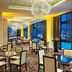 The Westin Copley Place, Boston lounge with tables, chairs and city-view windows