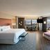 The Westin Copley Place, Boston suite with city skyline view, king bed, sofa, and desk