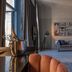 62 Castle Street, Liverpool: stylish guest room with blue bed, sofa seating, and large windows