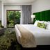 Grand Bohemian Lodge Greenville, Autograph Collection room with balcony view and king bed in Greenville