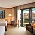 The Bostonian Boston guest room with two beds and a balcony view over Boston
