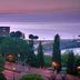 Waterfront Hotel Downtown Burlington in Burlington with lake view and dock at dusk
