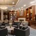 Club Quarters Hotel Faneuil Hall, Boston lobby lounge with seating area, fireplace, and display shelves