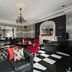 Park International Hotel London lounge with black-and-white checkered floor and red-accented seating
