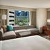 Marriott Downtown at CF Toronto Eaton Centre room with city view, sofa, desk and TV in Toronto
