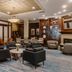 Club Quarters Hotel Faneuil Hall, Boston lobby lounge with seating area and fireplace