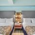 Canario Lagoon Hotel, San Juan: twin guest room with two beds and a central bedside table