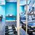 Novotel Toronto North York gym with treadmills, dumbbells and floor-to-ceiling mirrors in Toronto