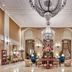 Intercontinental Hotels Mark Hopkins San Francisco lobby with chandelier, floral centerpiece and ornate seating