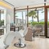 La Concha Resort, Puerto Rico, Autograph Collection salon with styling chairs and ocean-view patio in San Juan