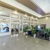 Alexis Park All Suite Resort Las Vegas lobby entrance with glass doors and seating area