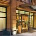 Orchard Garden Hotel San Francisco entrance with glass doors and illuminated facade