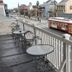 French Quarter Suites Hotel in New Orleans balcony overlooking a streetcar and French Quarter street