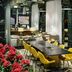 Millennium Hilton New York One UN Plaza lounge with yellow chairs and city-view windows in New York