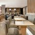 AC Hotels by Marriott La Rioja in Logroño: modern hotel lounge with tables, bar stools and seating