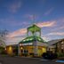 Best Western Plus Stoneridge Inn & Conference Centre in London with illuminated entrance at dusk