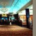 Britannia International Hotel London grand lobby with ornate chandelier and patterned carpet