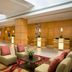 Lobby seating area at Marriott Downtown at CF Toronto Eaton Centre in Toronto with skylight and modern decor