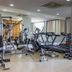 Fitness room at Luxor Soft Hotel Teresina in Teresina with treadmills, weights and exercise bikes