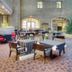 Delta Hotels by Marriott London Armouries in London, interior dining area with tables and chairs