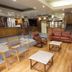 Hotel Melillanca Valdivia lobby with leather seating, coffee tables and reception area