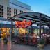 Horseshoe Las Vegas exterior with Giordano's patio and bustling walkway in Las Vegas