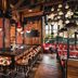 The LINQ Hotel & Casino in Las Vegas bar and restaurant with high-top seating and pendant lights