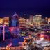 Rio Hotel & Casino, a Destination by Hyatt Hotel in Las Vegas skyline at night with city lights
